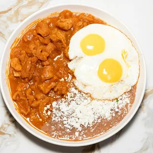 Chicharrón & Eggs Crispy pork rinds served with any of our home made sauces, two eggs any style, refried beans on the side and tortillas.