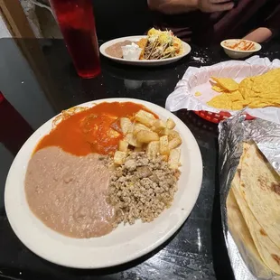 Tuesday breakfast special huevos rancheros. I left that plate clean! No left overs And under $10 bucks minus tip.