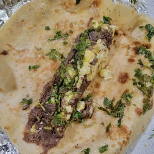 Not real machacado. Just greasy barbacoa.