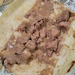 Carne guisada. Average.