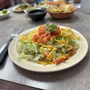 The bean and cheese tostada was simple and delicious. Guacamole was great.