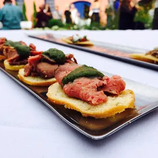 Our beef tenderloin crostini with chimichurri sauce is a crowd favorite.