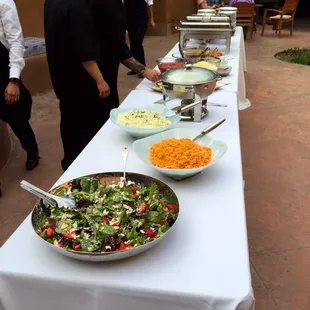 New Mexican Taco Bar with Seasoned Beef, Deconstructed Chicken Fajitas, Fresh Tortillas, Salsas, Mexican Rice and Black Beans.