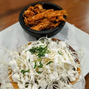 Tostada de Tinga. I asked for the chicken tinga to be on the side and add refried beans to my tostada. Deliciosa!