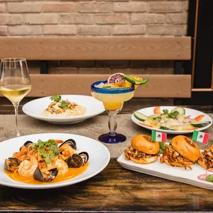 plates of food and drinks on a table