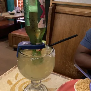  margarita in a glass with a straw