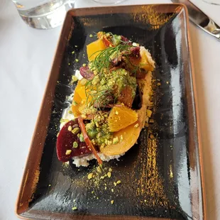 Roasted Beet Salad with whipped Ricotta, winter citrus, pistachio and arugula pesto
