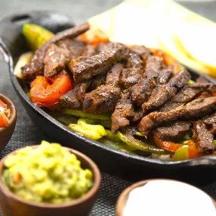 Steak Fajita Plate, served with rice, beans, soup or salad.