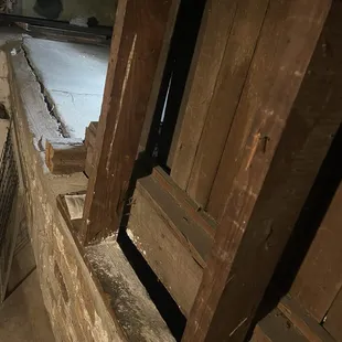 The house sinking and collapsing. So much water damage under this house.