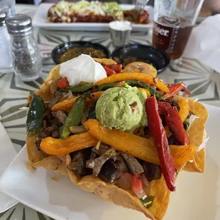 Taco salad with carne Asada.  Absolutely delicious all the way to the bottom and even the shell.