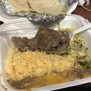 Carne asada to go. The steak was actually tender and had a nice flavor going on.