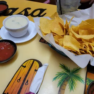 Large queso with complimentary chips and salsa! Delicious!