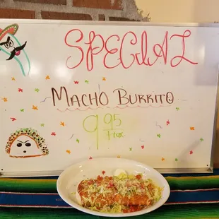 a plate of mexican food on a table