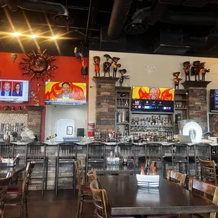 the bar and dining area of a mexican restaurant