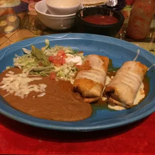 The las chimis with refried beans &amp; mexican salad. It reminds me of my childhood.