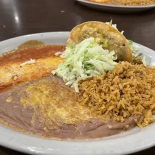 Combination plate: taco, rice &amp; beans, and enchilada