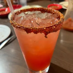 Strawberry margarita with Tajín &amp; chamoy rim- I asked for Tajín and they asked if I wanted the rim. SOOOOOO delicious!