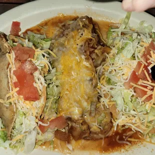 This plate was a number for Taco tostada and chili rellenos there was no rice and beans such a beautiful chile relleno