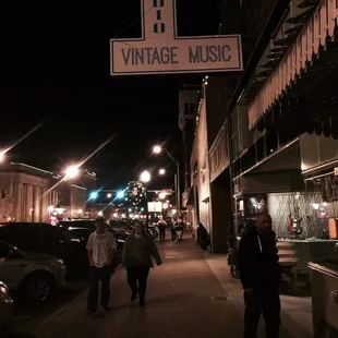Hubby at the very festive street side entrance...