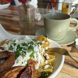 Chilaquiles with rib eye! So delicious! And cafe de olla!