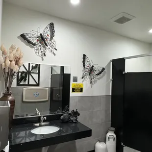 Two restroom stalls in the women's restroom.