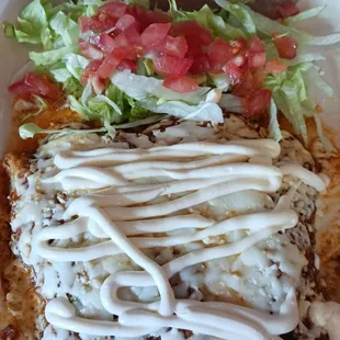 Enchiladas rojas with pollo entreé