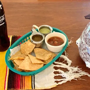 a plate of chips and salsa