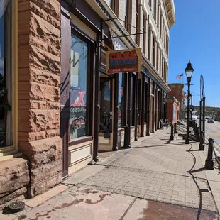 a sidewalk in a small town