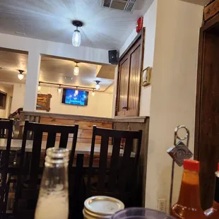 a view of the dining room from the bar