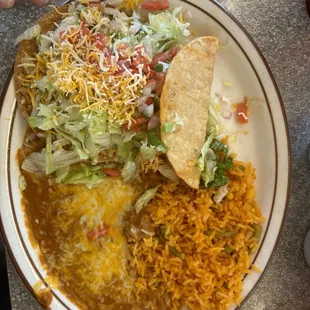 Medium Combination with chicken taco and bean tostada