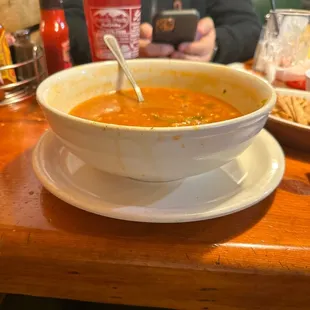 A trough of tortilla soup that was mostly rice.