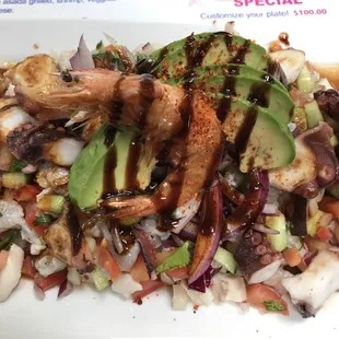 Mixed seafood toastada (shrimp, fish, octopus)