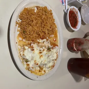 Cheese enchildas with double rice, chingos of onion on my enchildas, yummy