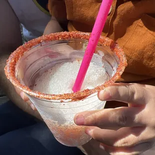Non- alcoholic tahin &amp; chamoy rimmed cider slushee
