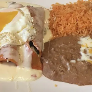 Steak fajita enchilada lunch w/ an egg.