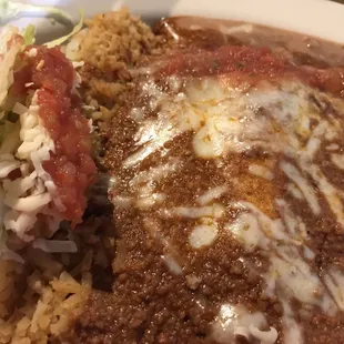 The Hennessy. Taco, enchiladas with chili, rice and beans.