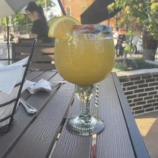 Melted frozen mango margarita
