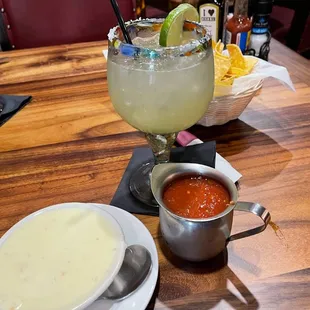 a margarita and a bowl of soup