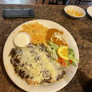 a plate of mexican food on a table