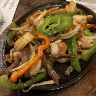 Shrimp - chicken and steak fajitas