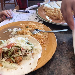 I had chipotle enchiladas and my son got the quesadilla and taco meals. All great! Salsa and the pico de gallo do not disappoint!