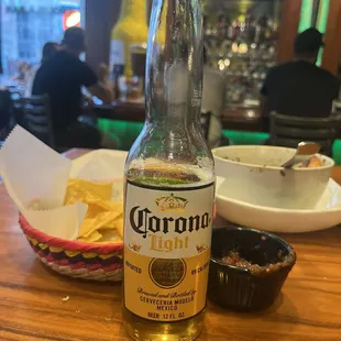 Delighted with a margarita on the rocks with my chips and salsa. A good Corona with my Mexican bowl.