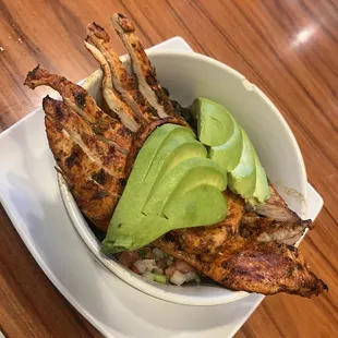 The Mexican bowl of rice, beans, avocados and grilled chicken.