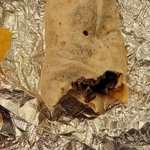 Carne Asada Burrito. Don't let the plain look and size deceive you... very flavorful and will fill you up!