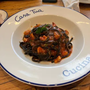 a plate of pasta on a table