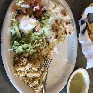 Veggie quesadilla after I finished half. Get the green salsa!