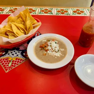Chips, salsa and frijoles dip