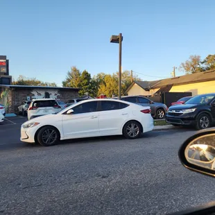 Cars blocking the street.