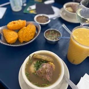 Cup of Soup of de Day (Sancocho De Costilla De Res) and Plato De Empanadas