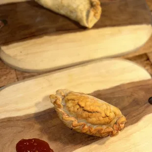 two pastries on a cutting board